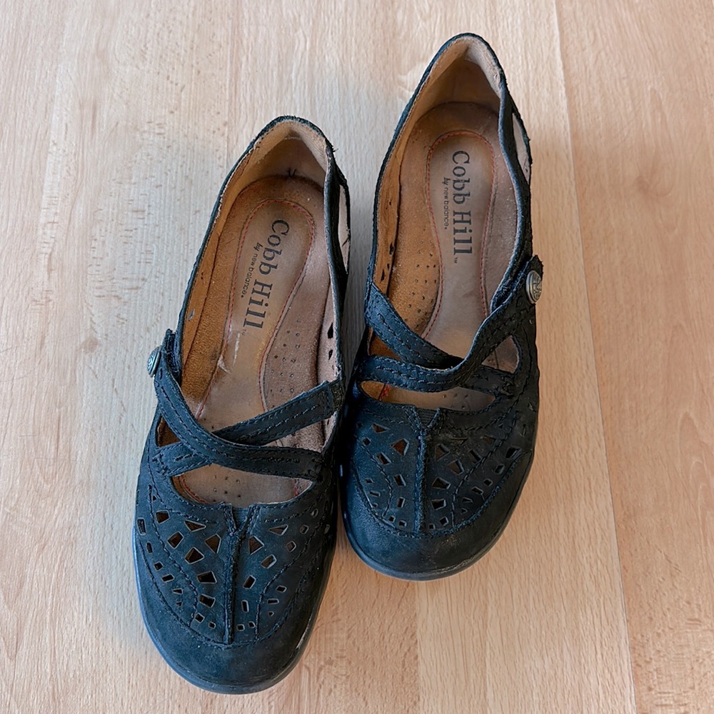 Black laser cut Cobb Hill by New Balance flats size 7